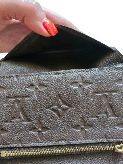 Louis Vuitton Curieuse wallet